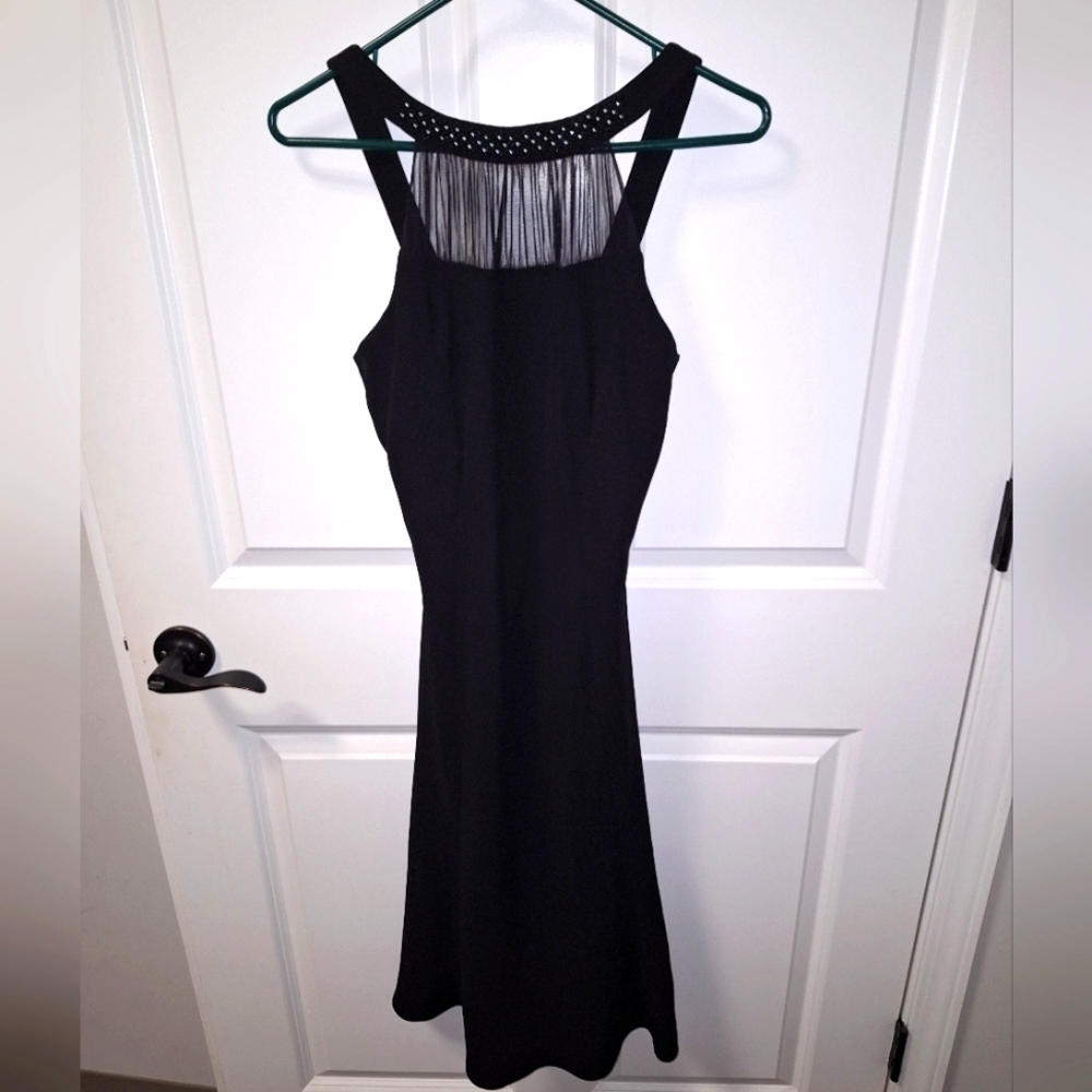 Evan-Picone black sleeveless maxi dress in a size 4. Flowing, sexy, formal,party